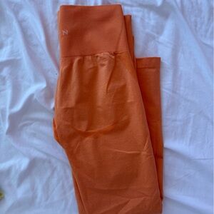 NVGTN Orange Leggings medium